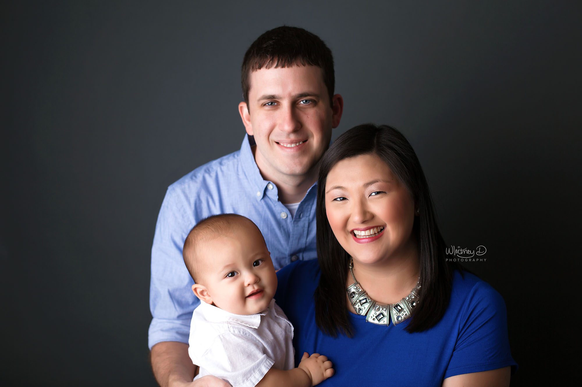 Baby Boy with his Mom and Dad at Whitney D Photography in Conway, Arkansas