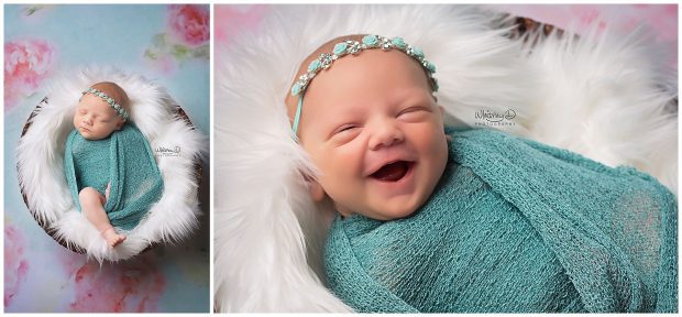 Smiling Newborn on floral background