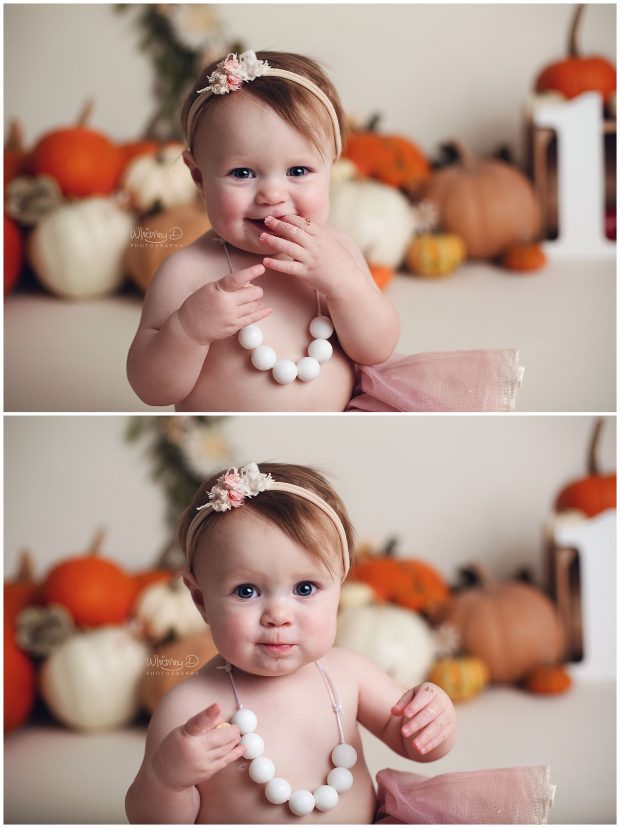 Birthday baby girl eating cake with pumpkins at Whitney D. Photography in Conway, Arkansas