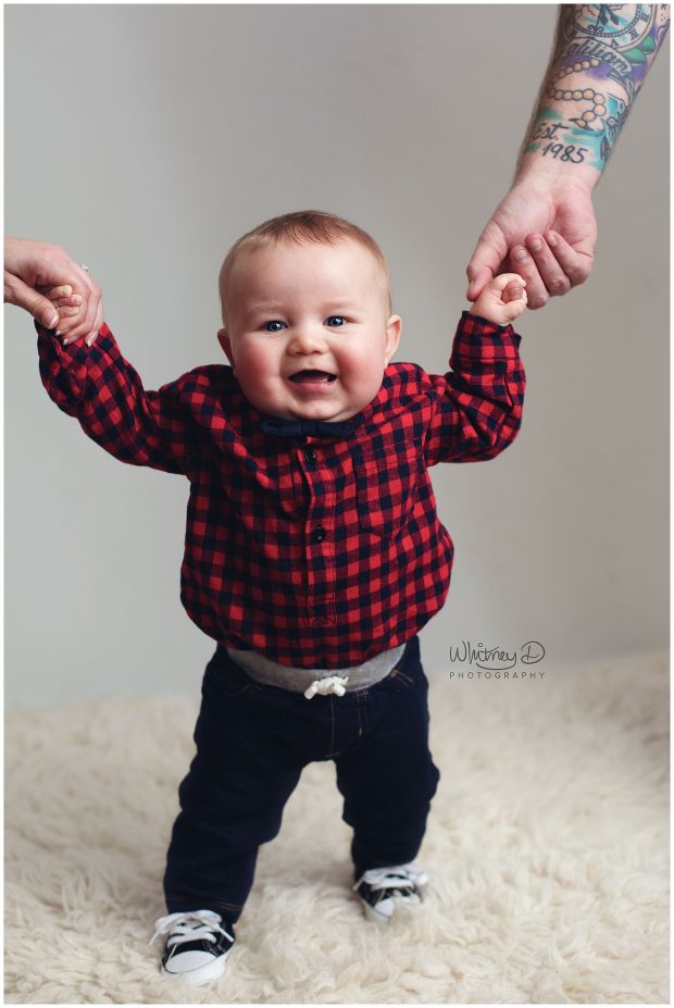 Six month Sitter baby boy standing at Whitney D. Photography in Conway, Arkansas