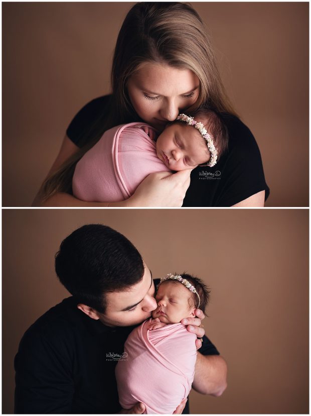 Newborn baby girl with mom and dad at photography session at Whitney D. Photography in Conway, Arkansas