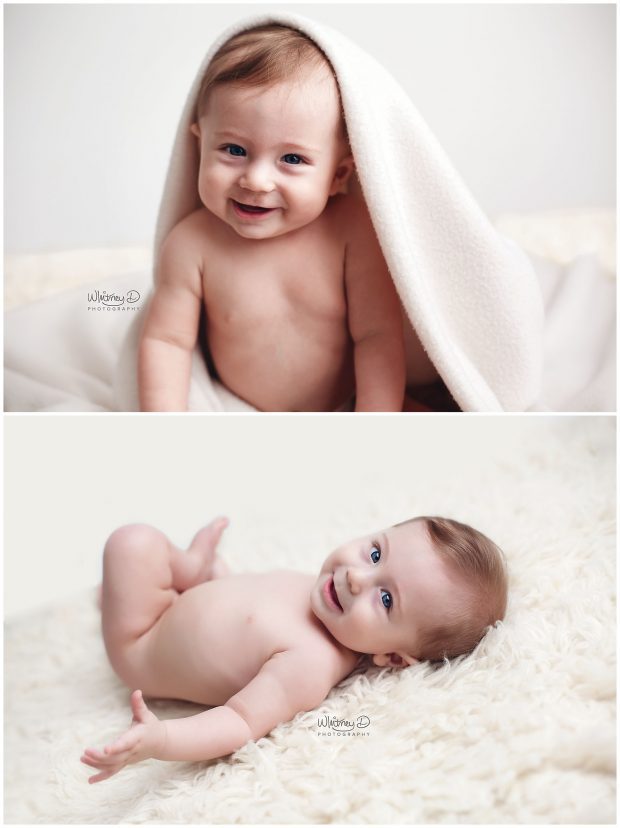 Six month baby boy smiling on white backdrop at Whitney D. Photography in Conway, Arkansas