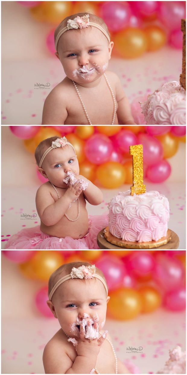 Baby girl first birthday session with pink and gold eating cake for cake smash at Whitney D. Photography in Conway, Arkansas