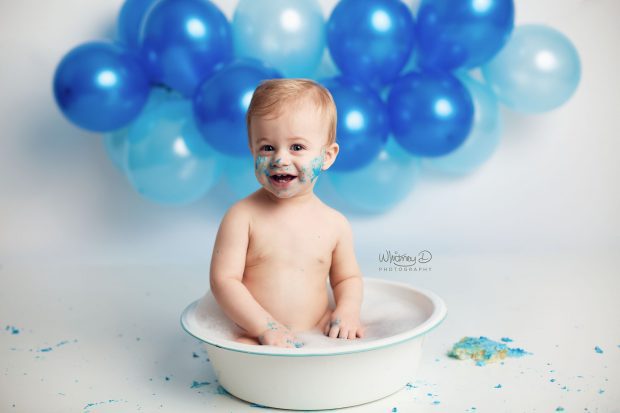 Baby boy's first birthday blue and white cake smash at Whitney D. Photography in Conway, Arkansas