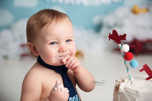 Baby boy's time flies first birthday cake smash at Whitney D. Photography in Conway, Arkansas
